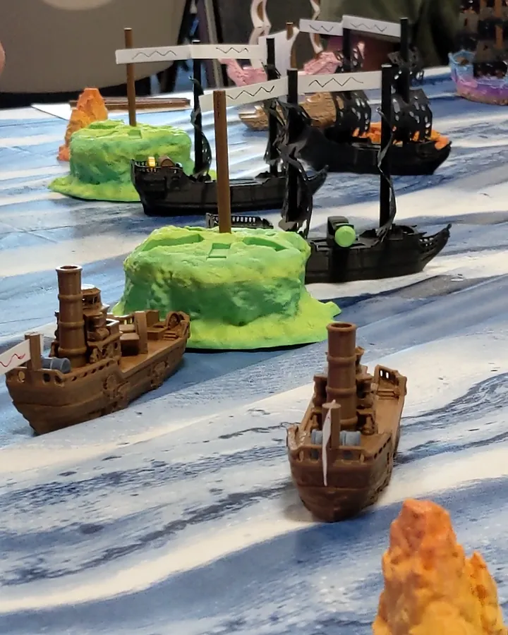 Two brown Industry steamships beside an island, with black Corsair ships behind.