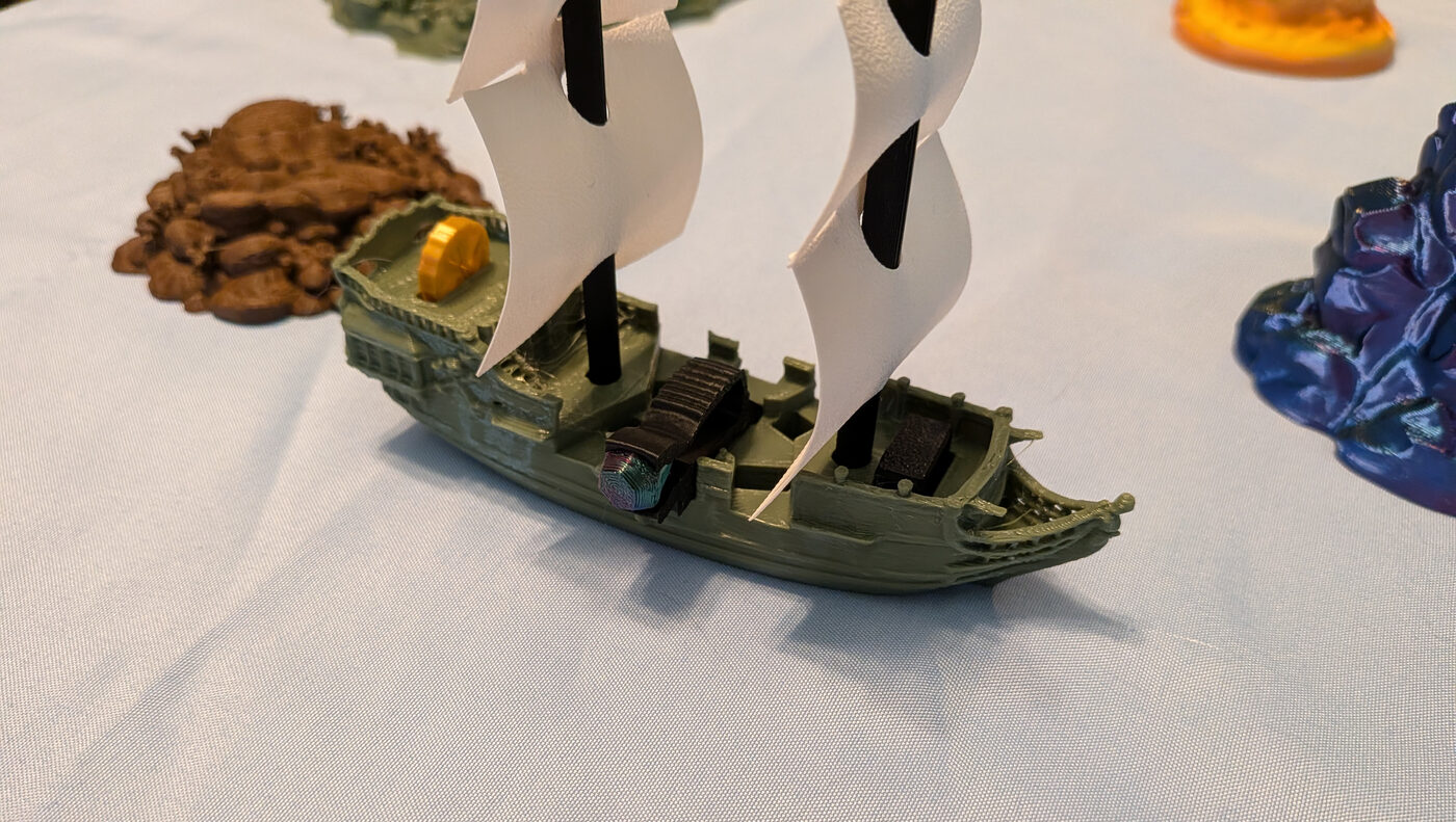 Corsair Fleet — four small ships, sails, and faction card.